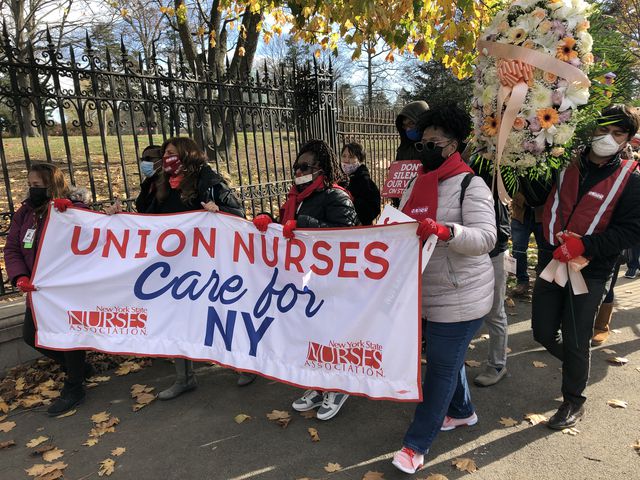 Nurses employed at Montefiore Health System in the Bronx march to Woodlawn Cemetery, protesting their demands for more nurses.